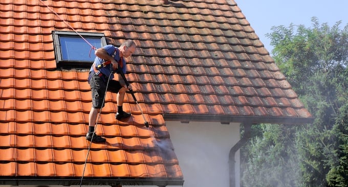 Why Pressure Washing Is a Must Before Roof Cleaning and Repairs